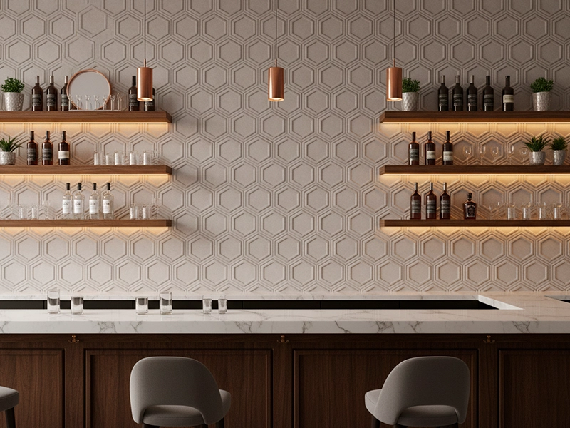 Handmade cement tile wall application with geometric relief pattern in a designer interior